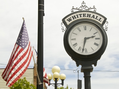 Whitehall clock with Flag - Whitehall, Michigan
